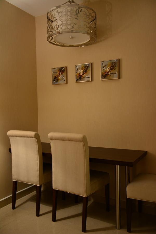 Home Inn Hotel Suites อัลโคห์บาร์ ภายนอก รูปภาพ