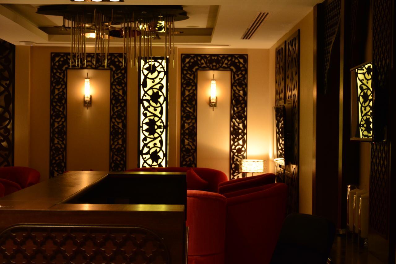 Home Inn Hotel Suites อัลโคห์บาร์ ภายนอก รูปภาพ