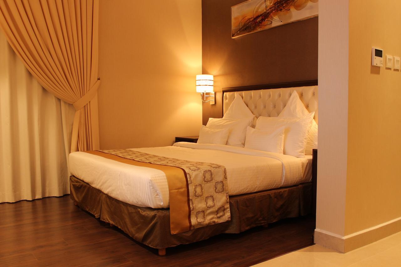 Home Inn Hotel Suites อัลโคห์บาร์ ภายนอก รูปภาพ