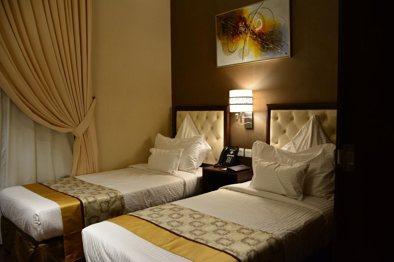 Home Inn Hotel Suites อัลโคห์บาร์ ภายนอก รูปภาพ